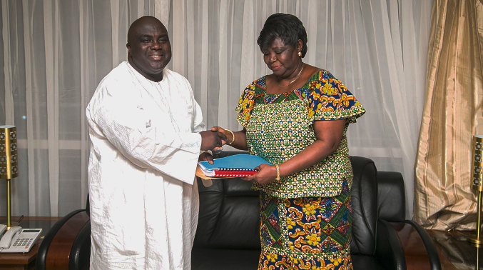 Mr Julius Debrah handing over the petitions to Madam Cecilia Johnson